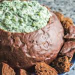 Spinach dip in a bread bowl